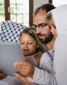 Dad and Kids with Touch Screen Tablet PC