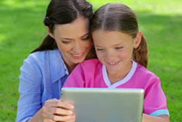 Mother and Child with Touch Screen Tablet